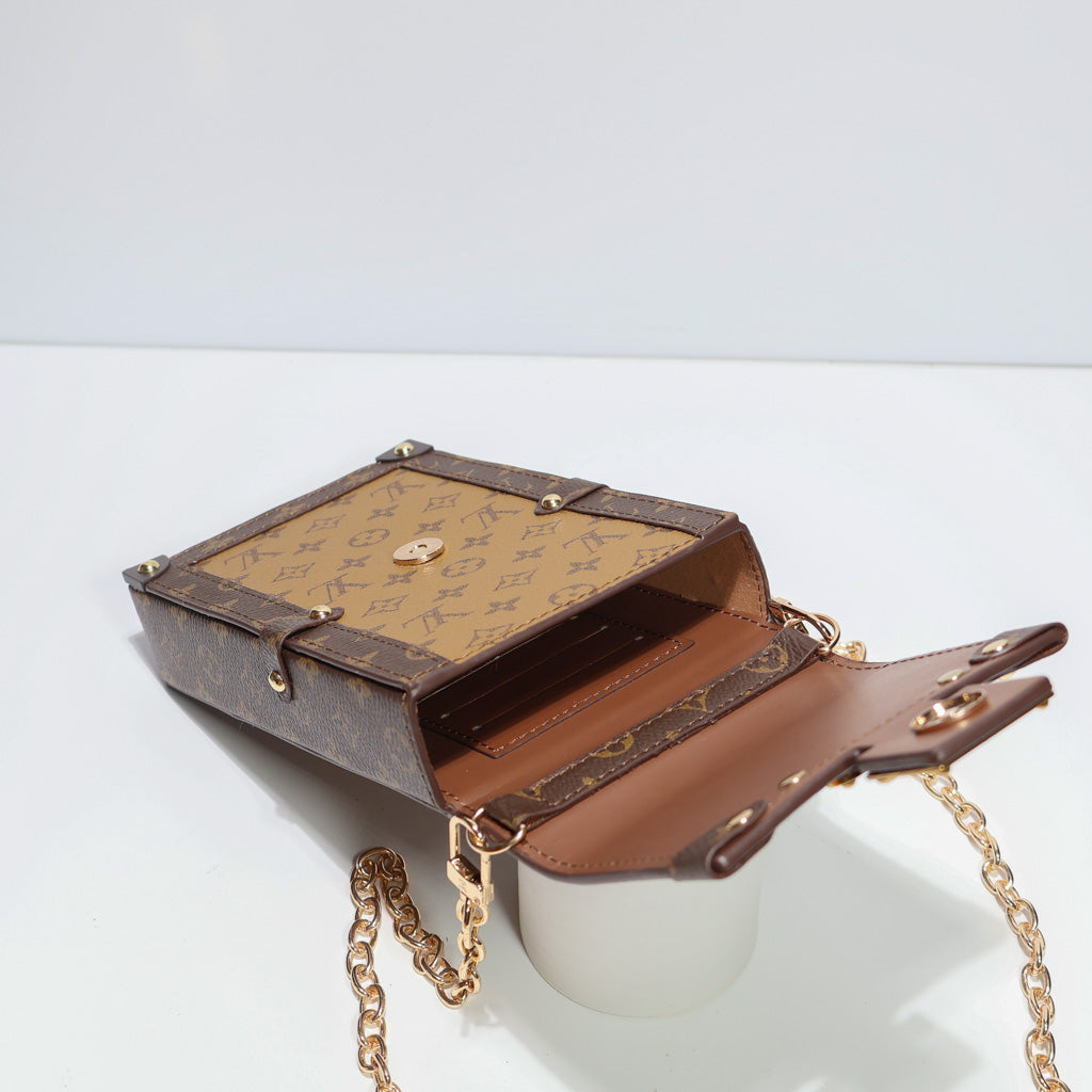 LV Vertical Trunk Pochette Crossbody Bag
