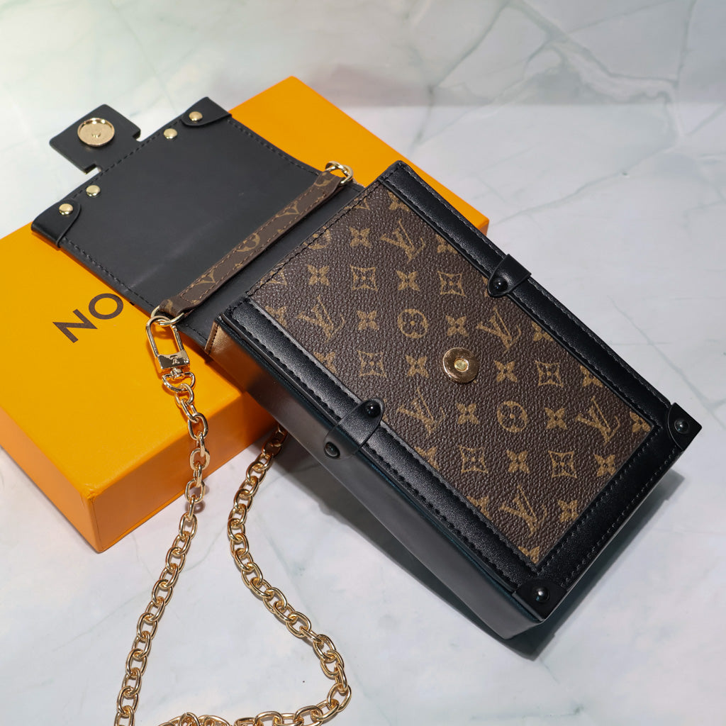 Louis Vuitton Vertical Trunk Pochette